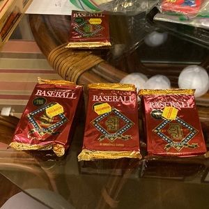 3 unopened packs of DonRuss Baseball Cards from 1992